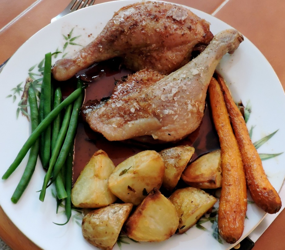 Duck with autumn fruit sauce, taters, roasted carrots and green beans.